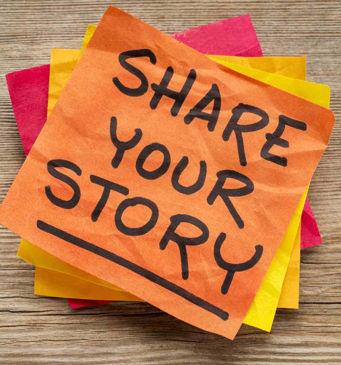 post it note with share your story for engaging content